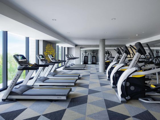 fitness room with treadmill and workout equipment
