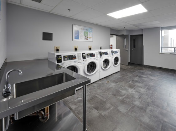 Laundry Facilities in Residence with various laundry machines