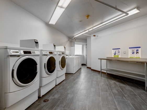Laundry at Seneca Residence with various laundry machines