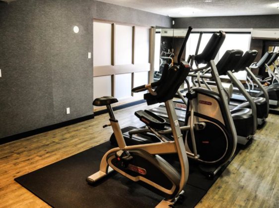 fitness room with stationary bike
