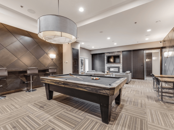 games room with pool table and seating