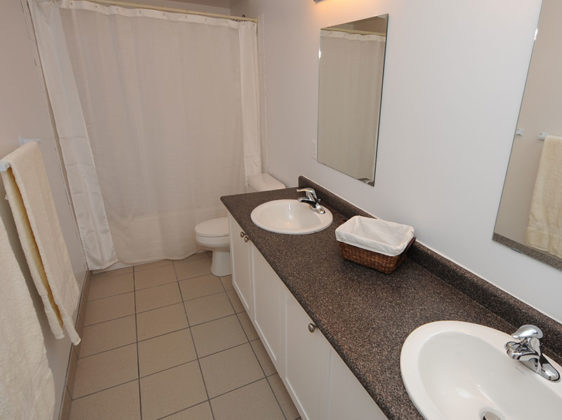 Student residence bathroom with 2 sinks