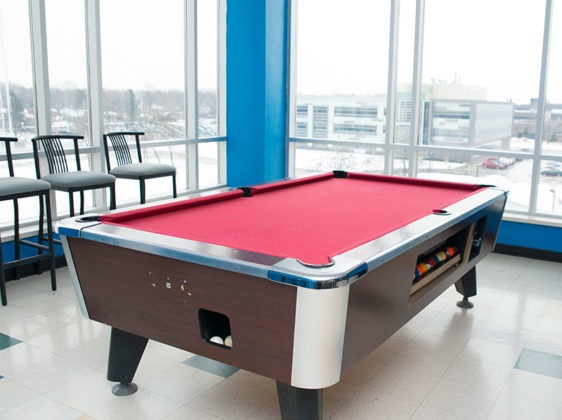 Student residence games room with pool table