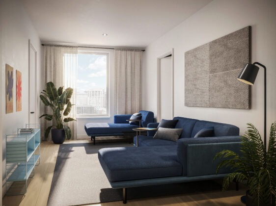 livingroom with large tropical plant under window, blue suede sectional and chaise lounge, and city view.